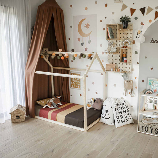 Montessoritoddler floor house bed frame in a girlroom