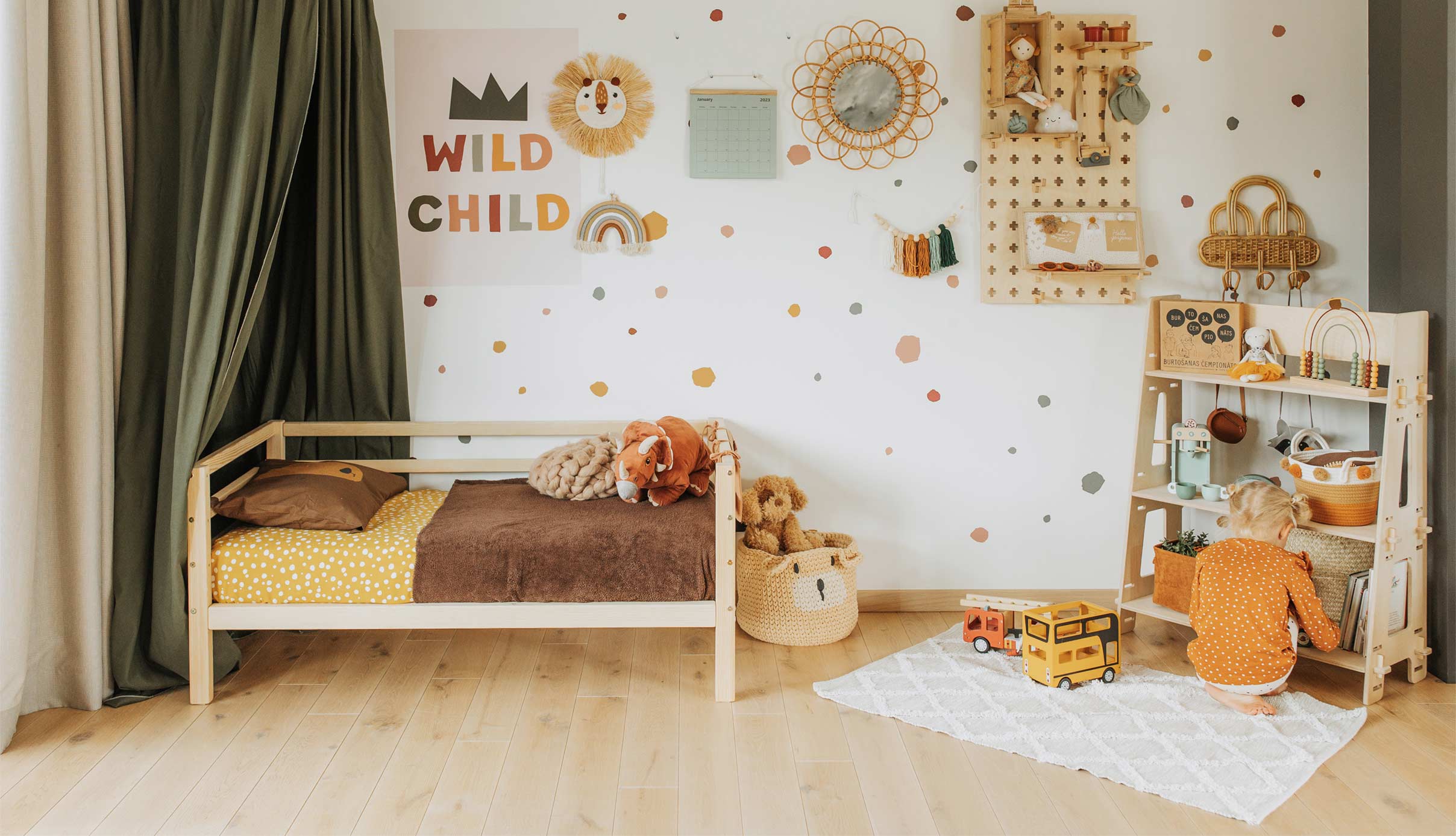 A child's room with a bed and toys.