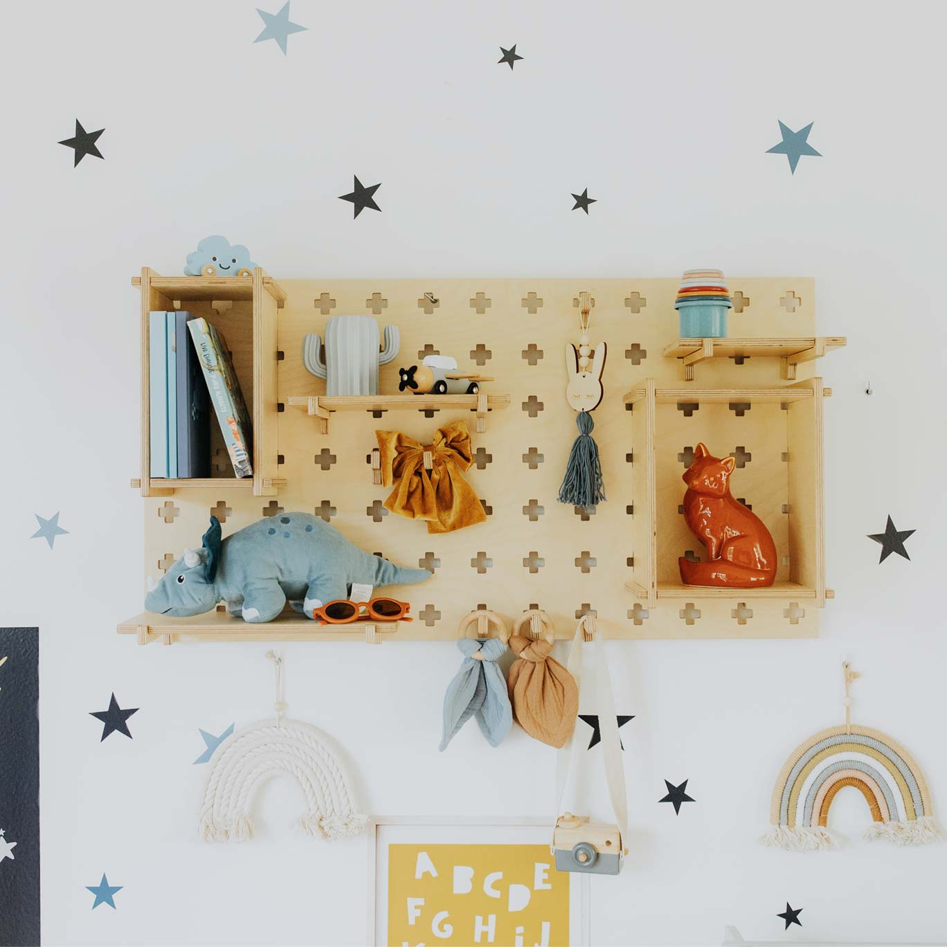 A child's room with stars on the wall.