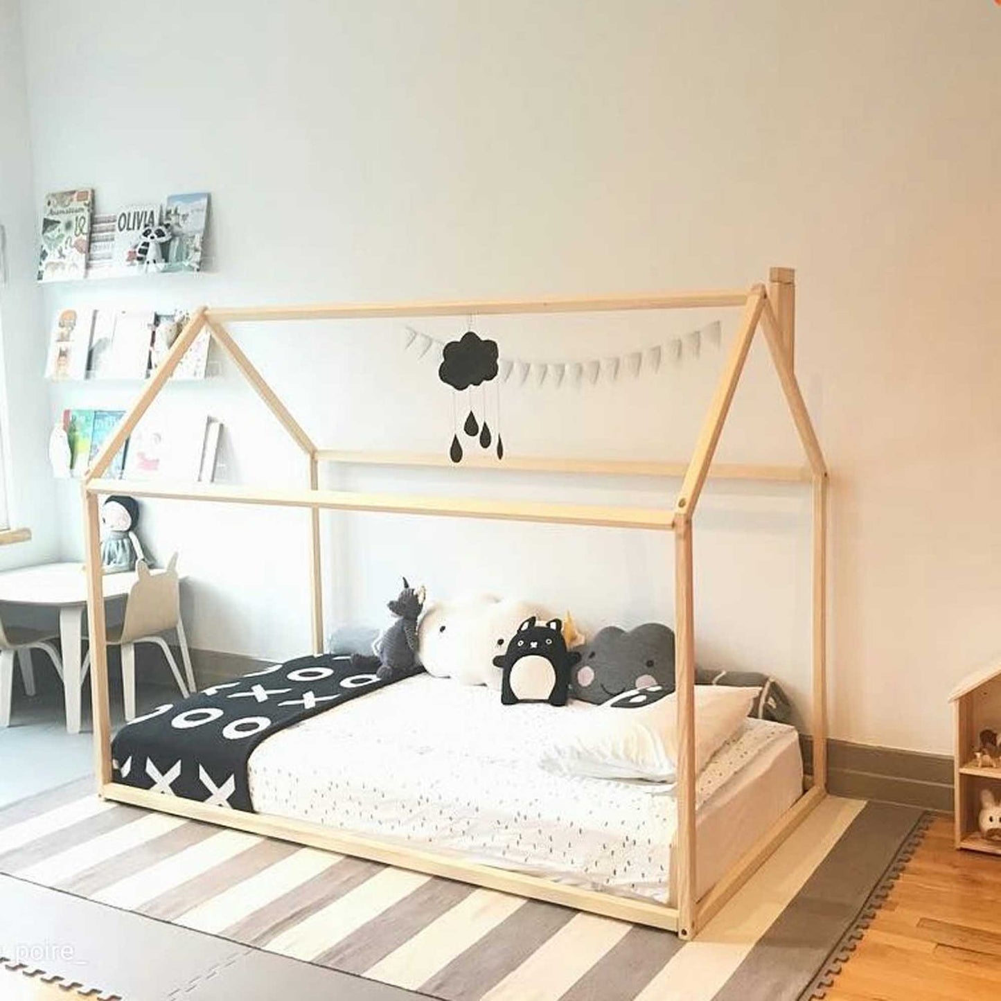 A cozy sleep haven adorned with a Sweet Home From Wood Wooden zero-clearance house bed.