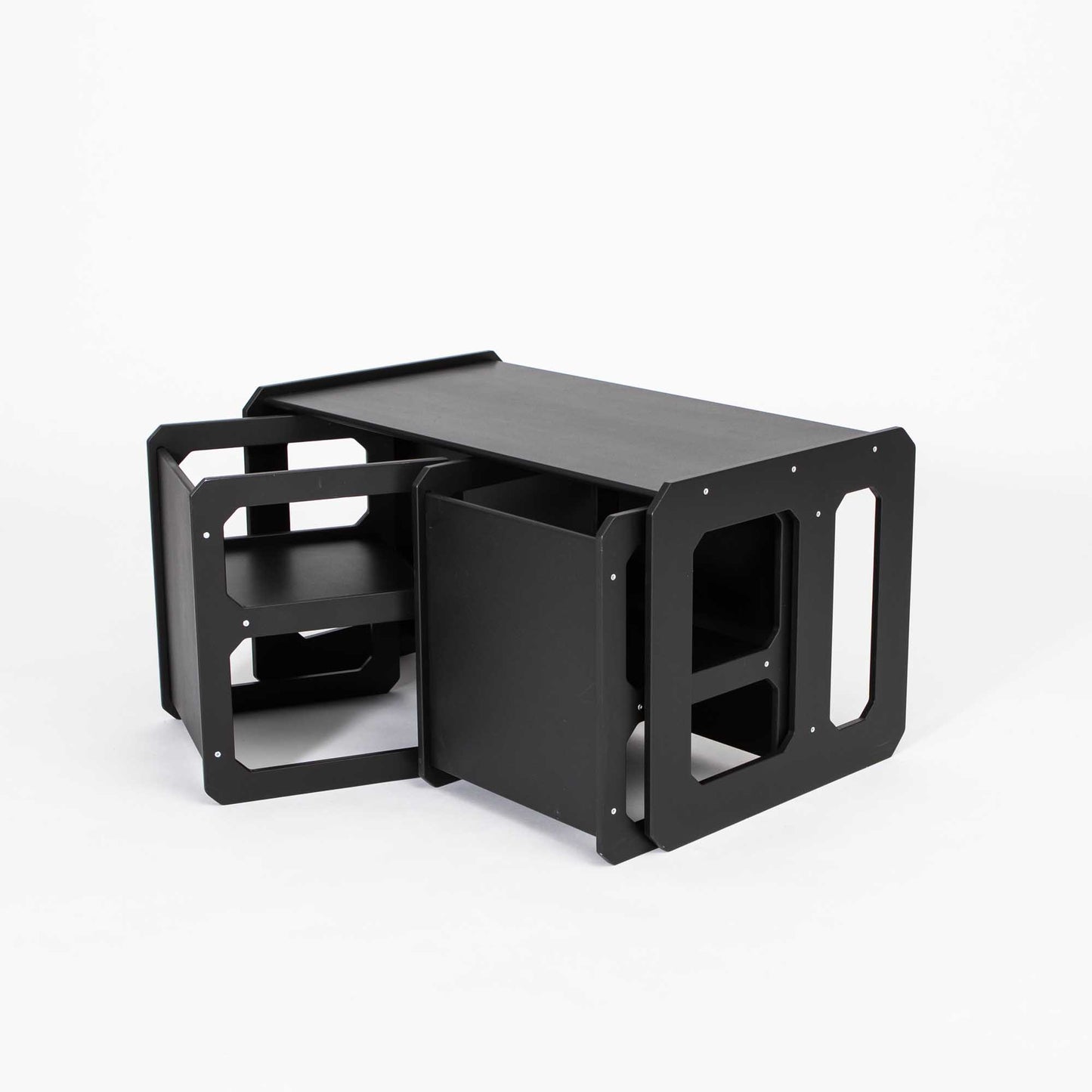 A Montessori weaning table and 2 chair set with two drawers and a shelf, perfect for setting up an independent toddler table.