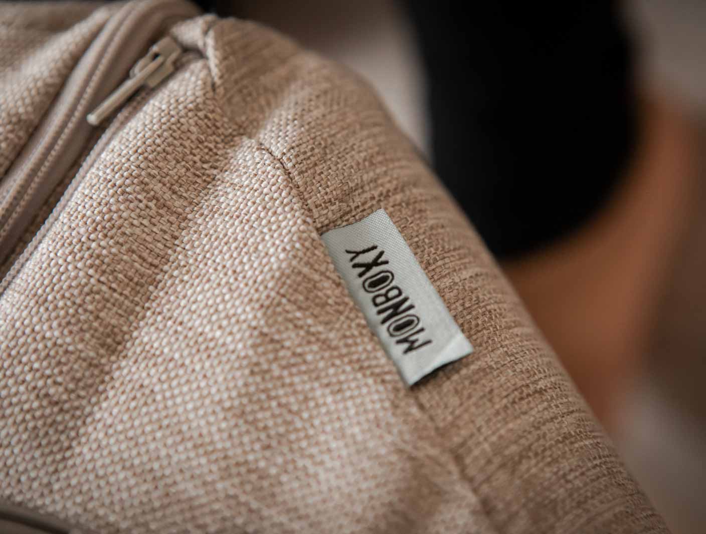A close up of a bag with a label on it.