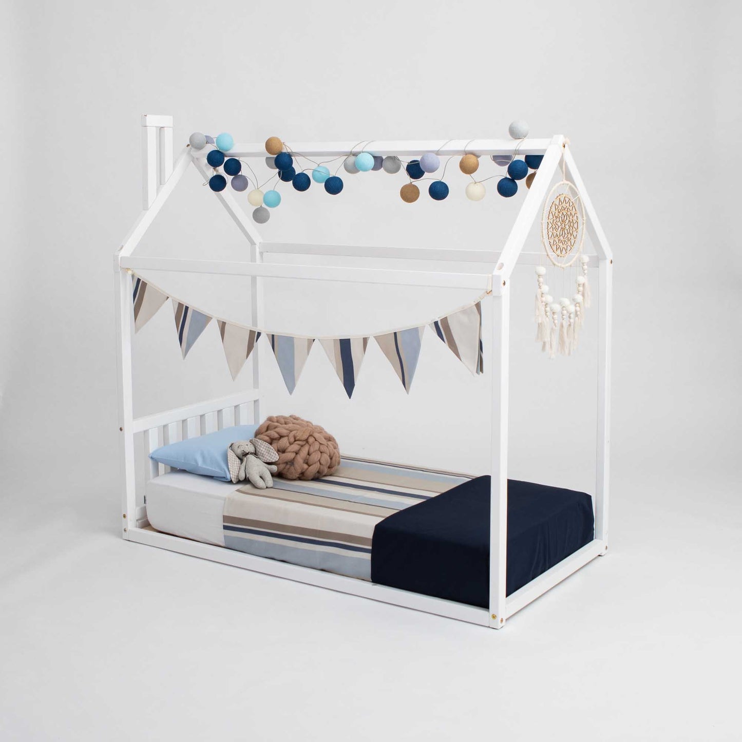 A Sweet Home From Wood House-frame Bed with a white canopy and cozy sleep.