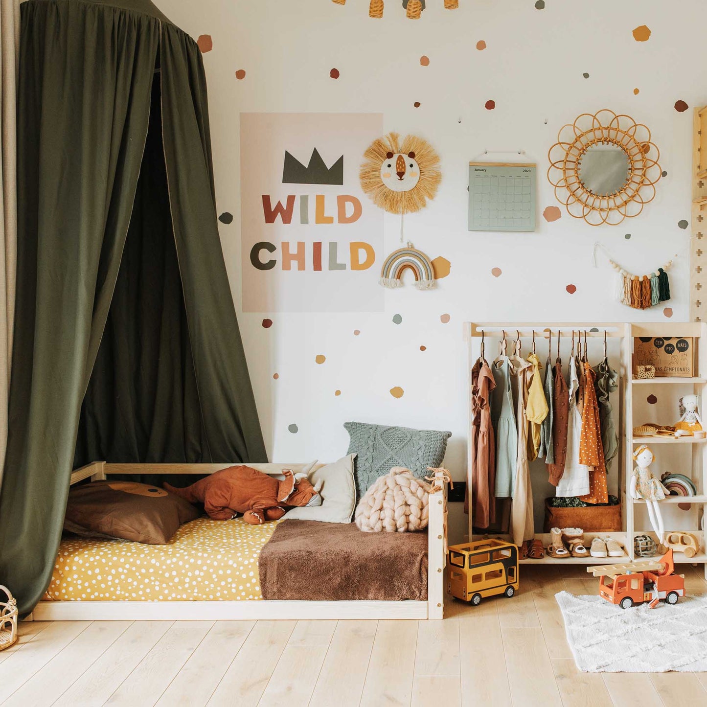 A Sweet Home From Wood children's floor level bed with 3-sided safety rail, complete with a canopy for added charm and comfort.