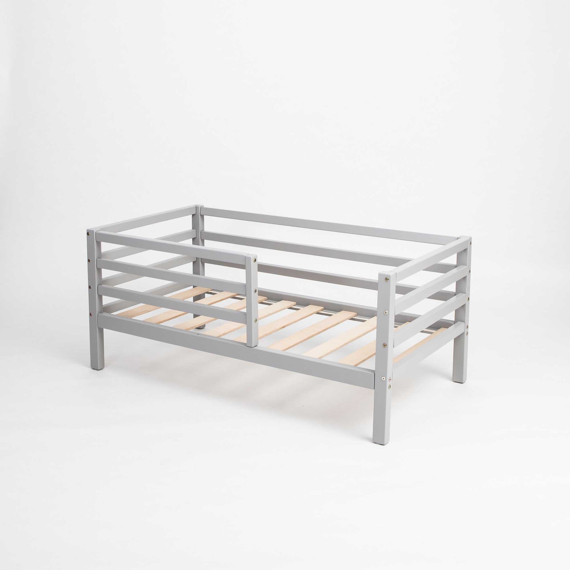 A Sweet Home From Wood Kids' bed on legs with a horizontal rail fence.
