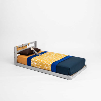 A Sweet Home From Wood 2-in-1 transformable kids' bed with a horizontal rail headboard designed to grow with child.