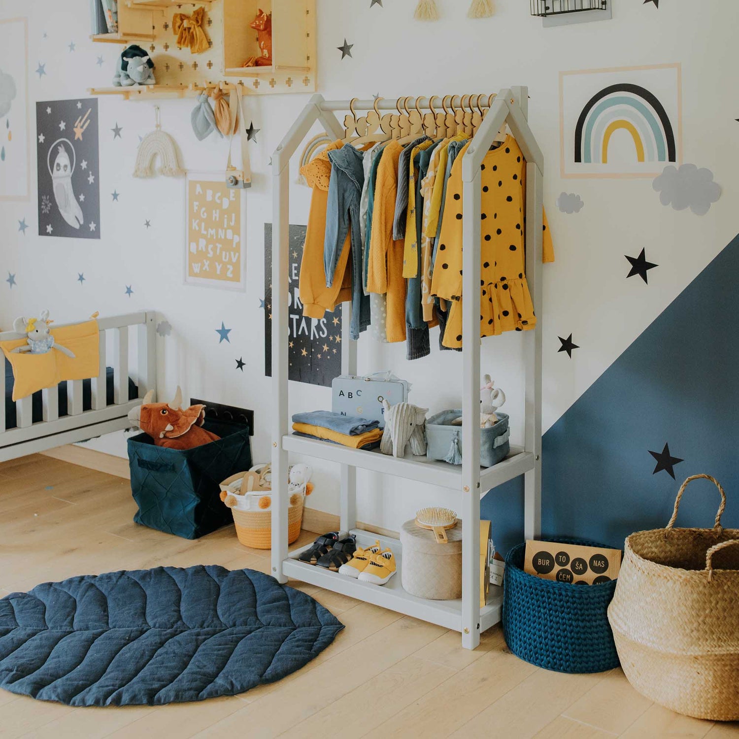 A child's room with a Montessori wardrobe from Sweet Home From Wood.