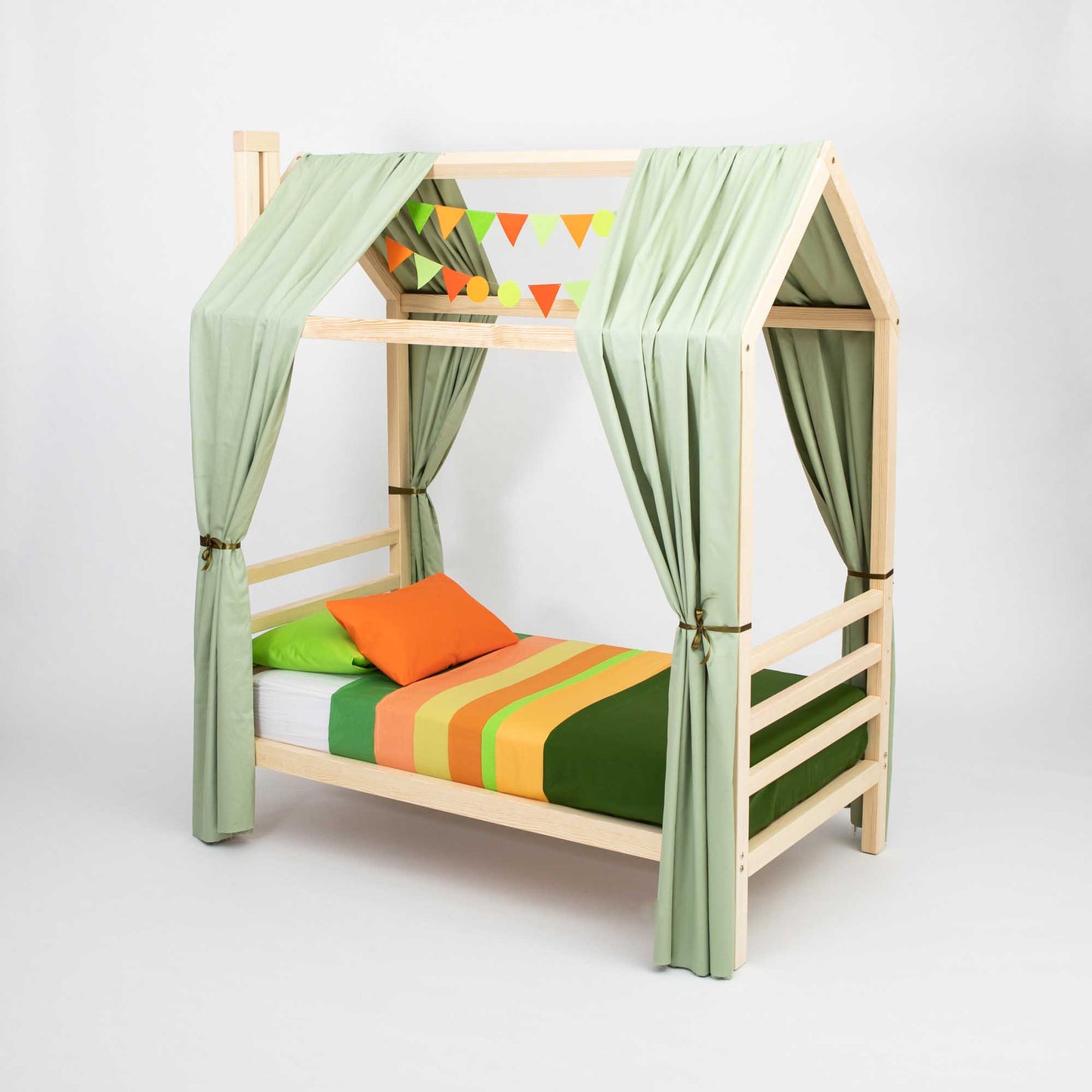 Introducing the Kids' House Bed on Legs with a Headboard and Footboard, featuring a charming wooden frame shaped like a cozy house. This delightful bed includes green curtains on the sides and an orange and green striped bedding set. The headboard is adorned with colorful geometric decorations, creating a warm and inviting sleeping space for your child.