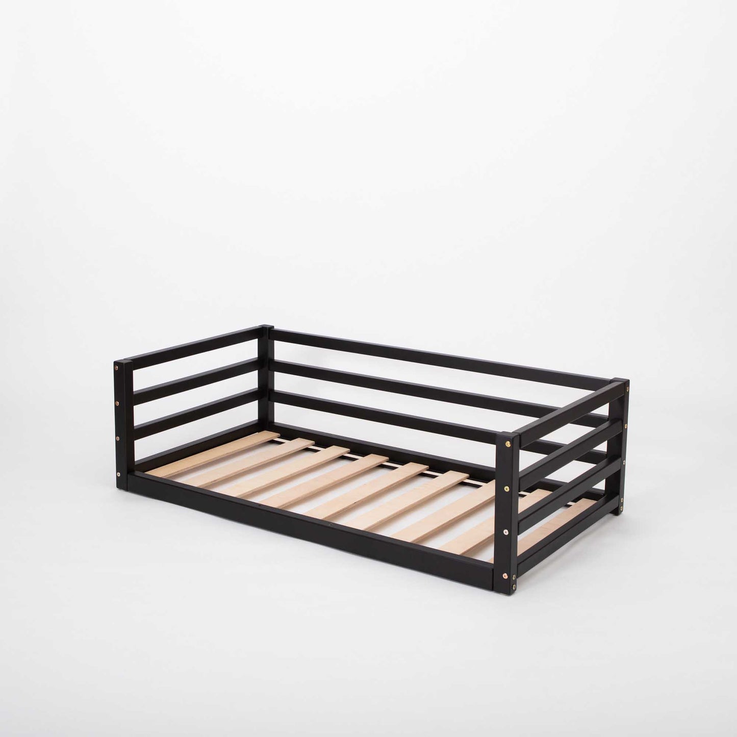 A Sweet Home From Wood transitional children's floor level bed with a 3-sided safety rail on a white background.