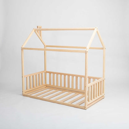 A Sweet Home From Wood Kids' house-frame bed with 3-sided rails, creating a cozy sleep haven for preschool children.