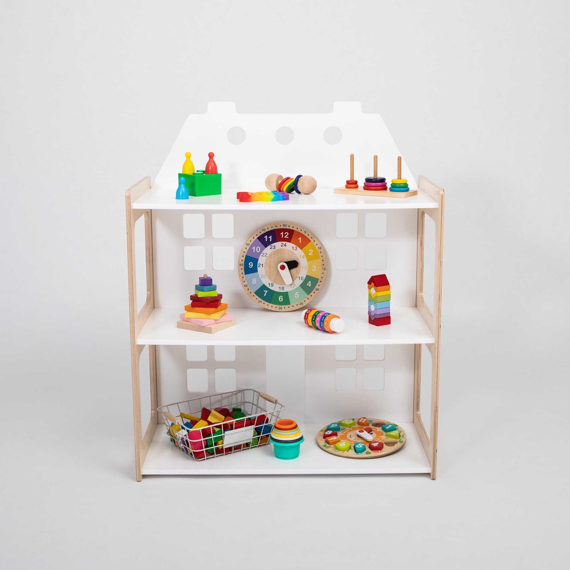 A Sweet Home From Wood Montessori toy shelf with a 2-in-1 doll house and toys.