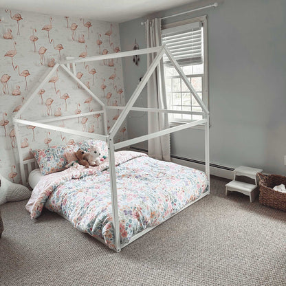 A cozy sleep haven for a preschooler, featuring a Sweet Home From Wood Montessori House-frame bed with a white frame.