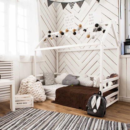 A child's room with a Kids' house-frame bed with 3-sided horizontal rails.