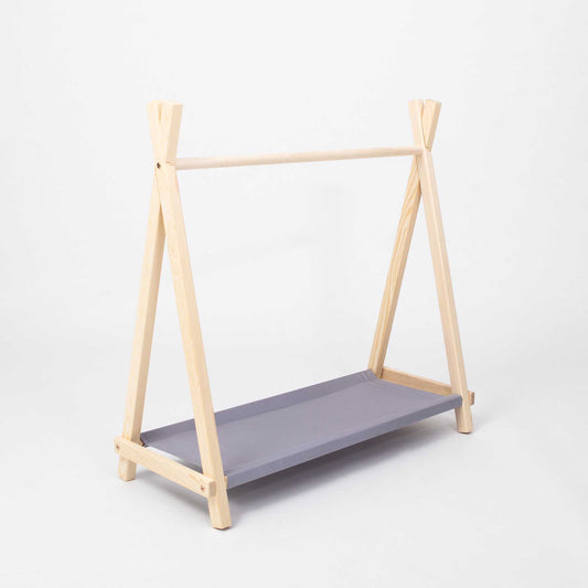 A Sweet Home From Wood kids' clothing rack with storage, featuring a grey shelf.