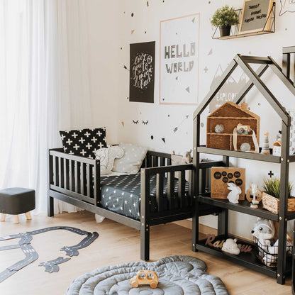 A long-lasting children's room with a Sweet Home From Wood 2-in-1 toddler bed on legs with a vertical rail fence and toys.