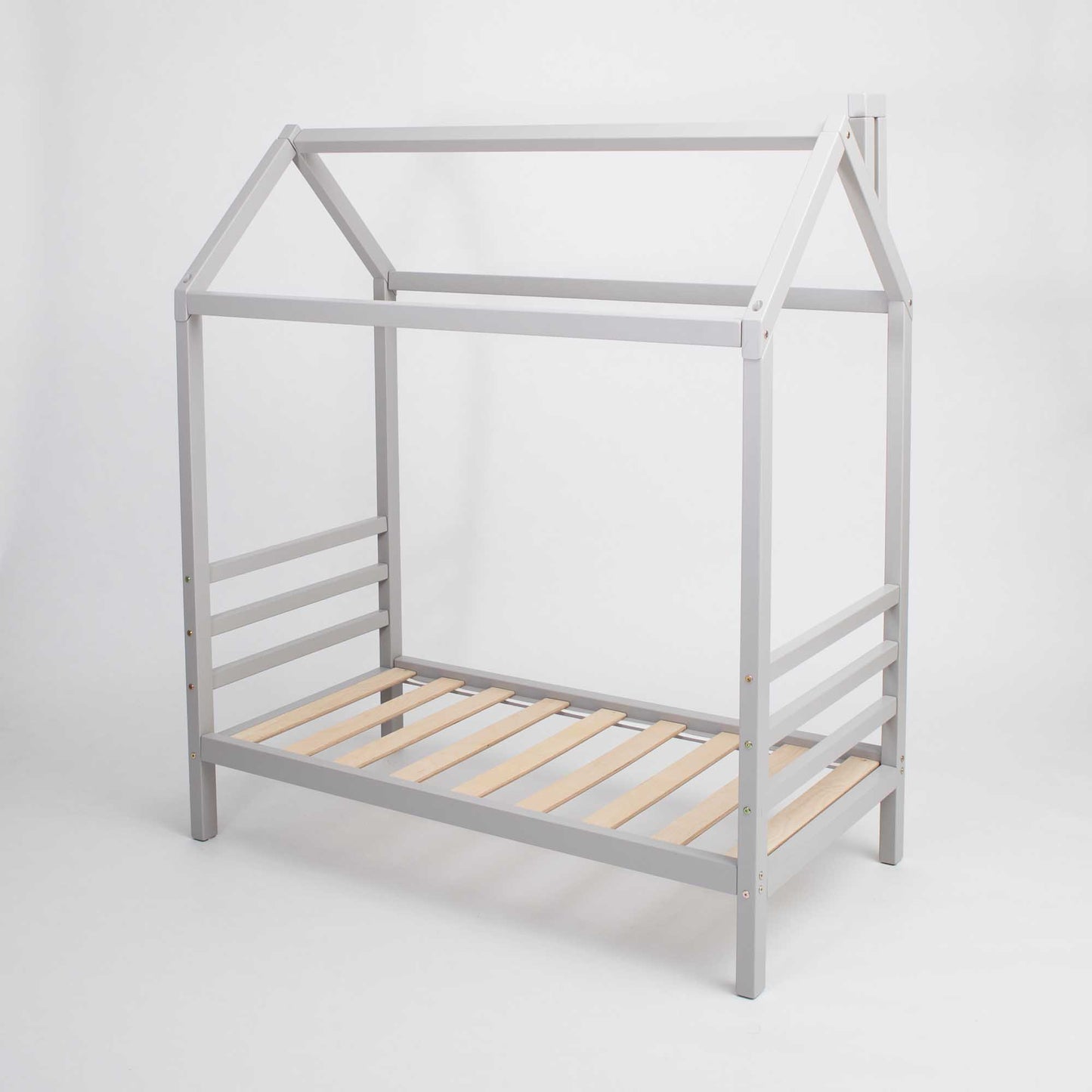 A Kids' house bed on legs with a headboard and footboard, made of grey wood, with wooden slats.