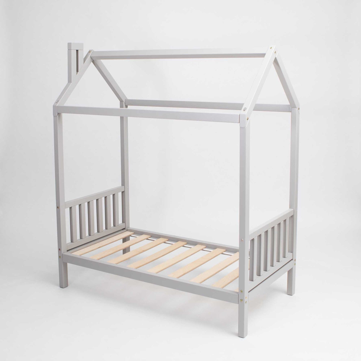 A Toddler house bed on legs with a headboard and footboard with a grey frame and raised wooden slats.
