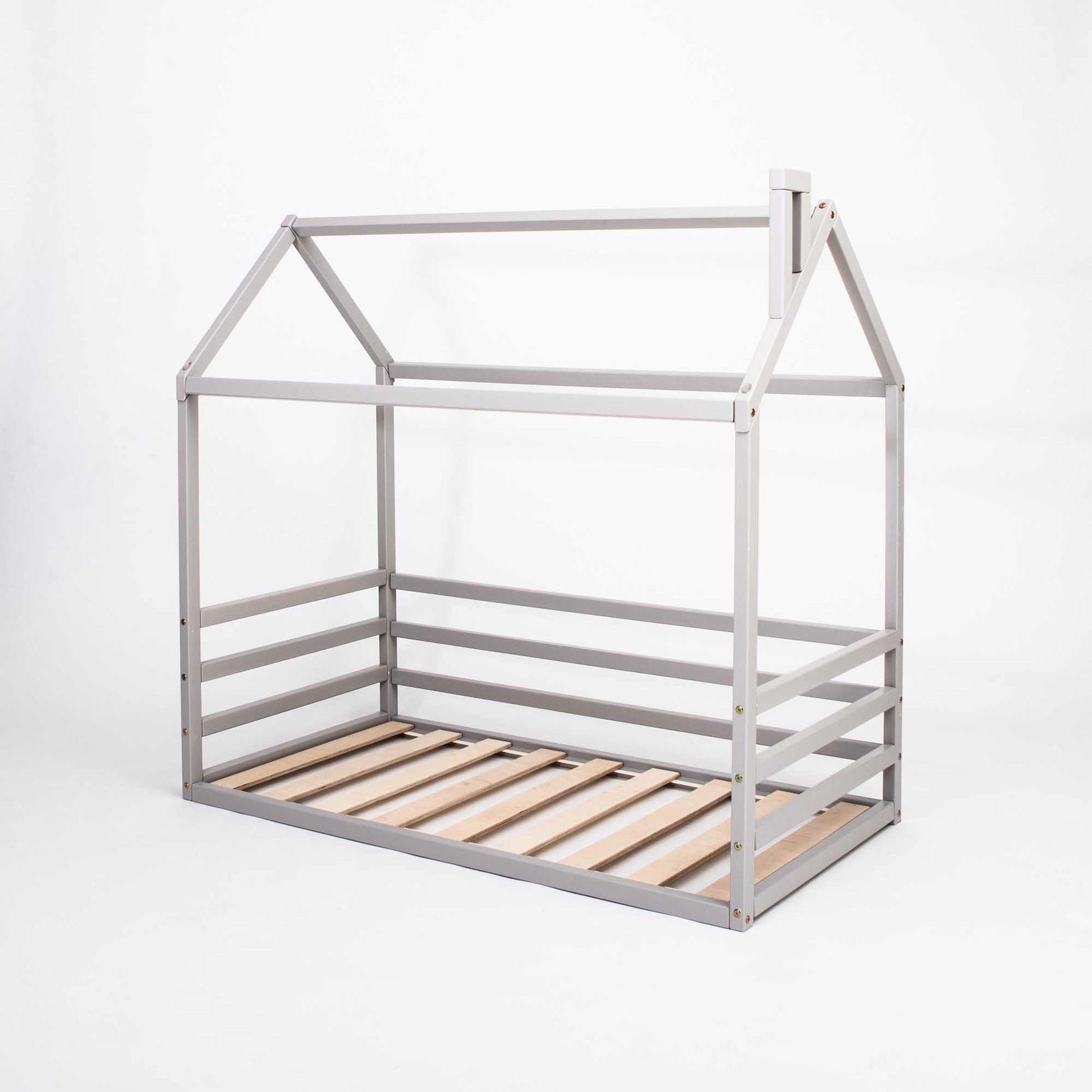 A grey wooden Kids' house-frame bed with 3-sided horizontal rails.