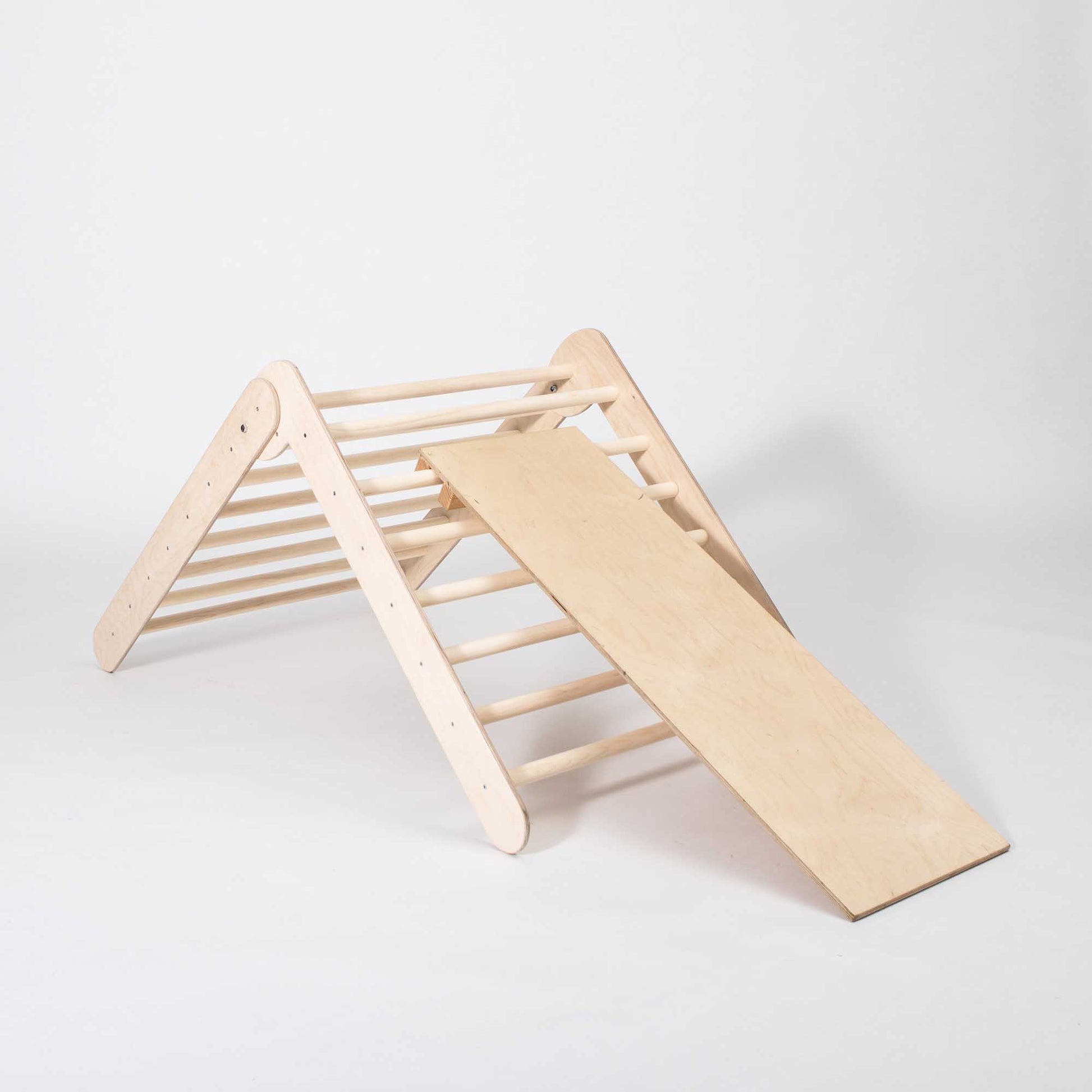 A Foldable climbing triangle with 2 slope levels, perfect for developing motor skills.