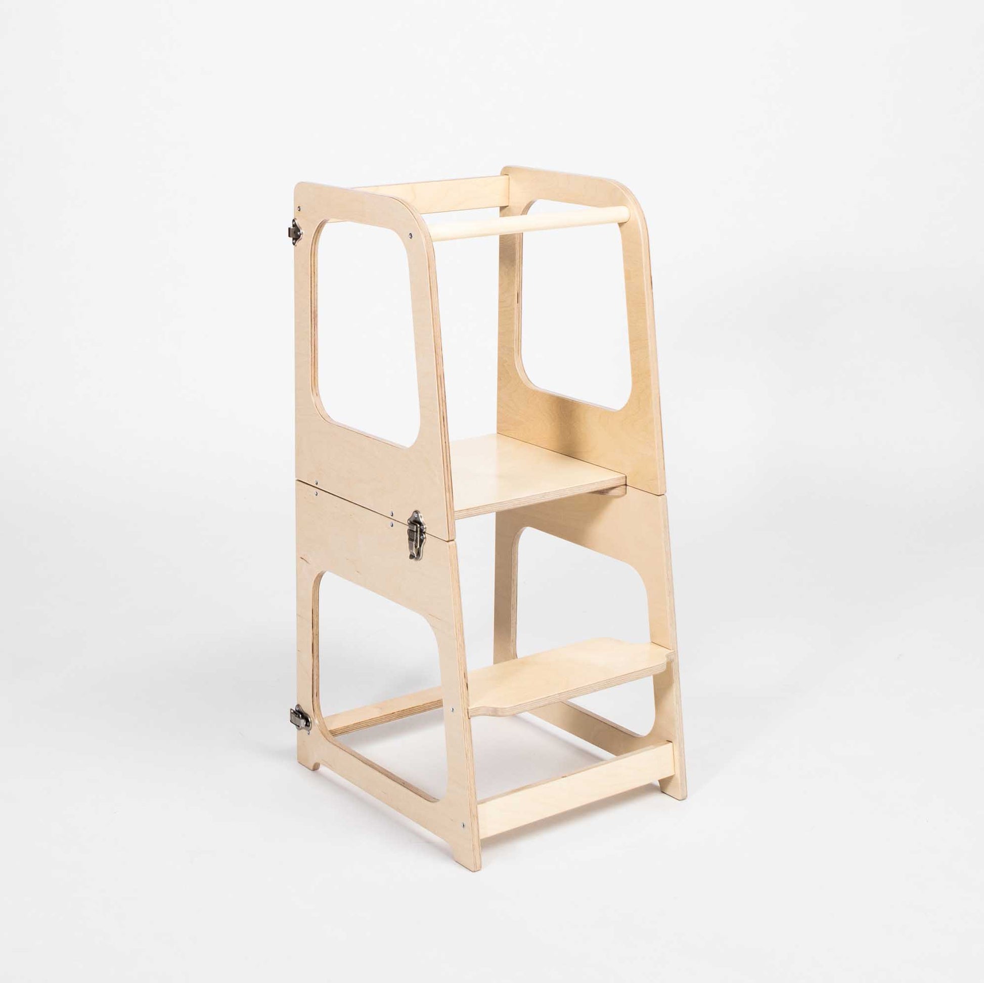 A Sweet Home From Wood 2-in-1 transformable kitchen tower - table and chair with a shelf on top.