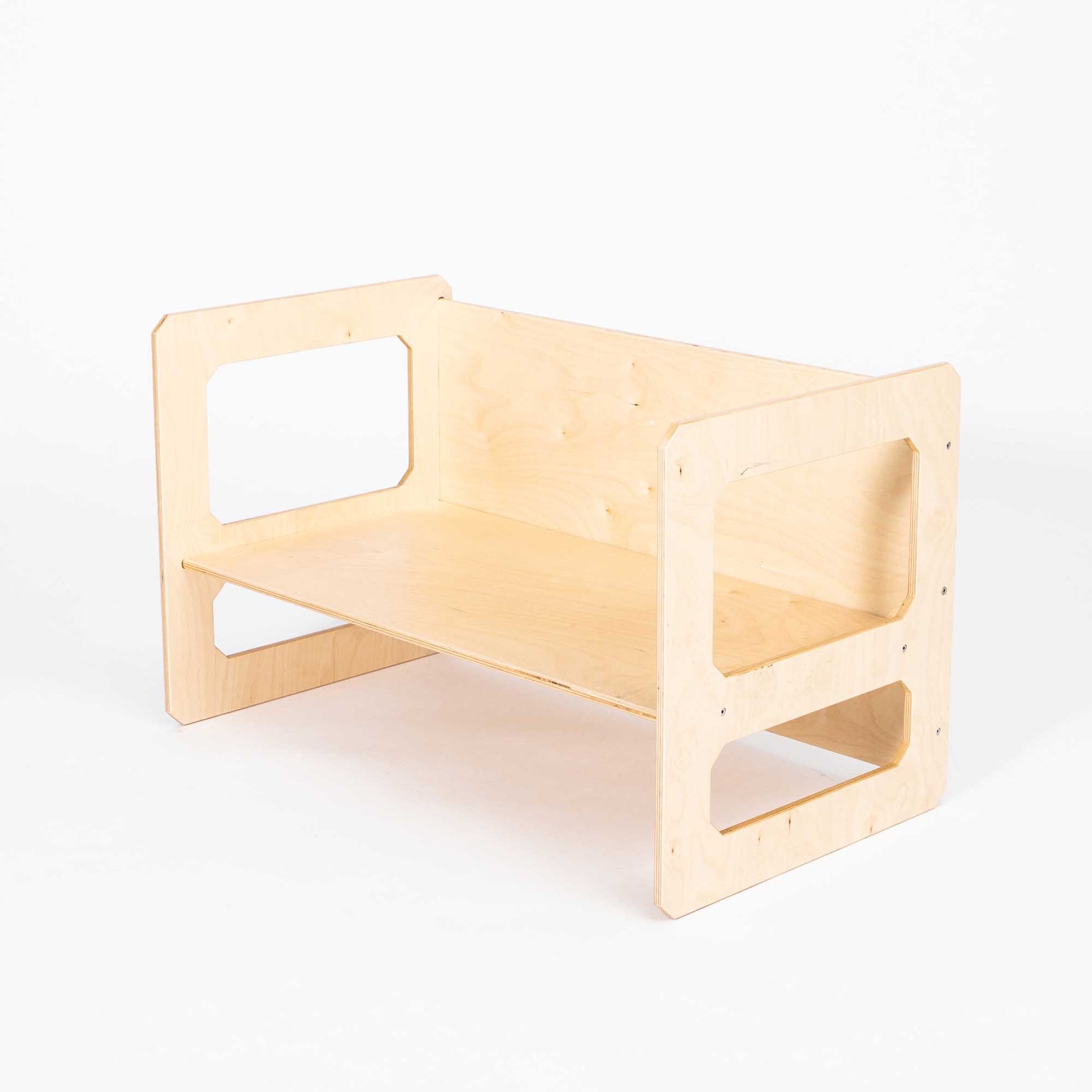 A Montessori weaning table with a shelf on it, suitable as a children's desk or toddler table from Sweet Home From Wood.