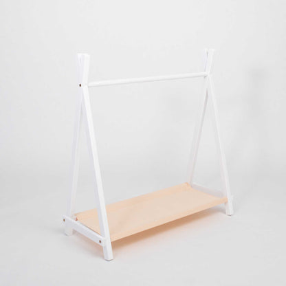 A Kids' clothing rack with storage.