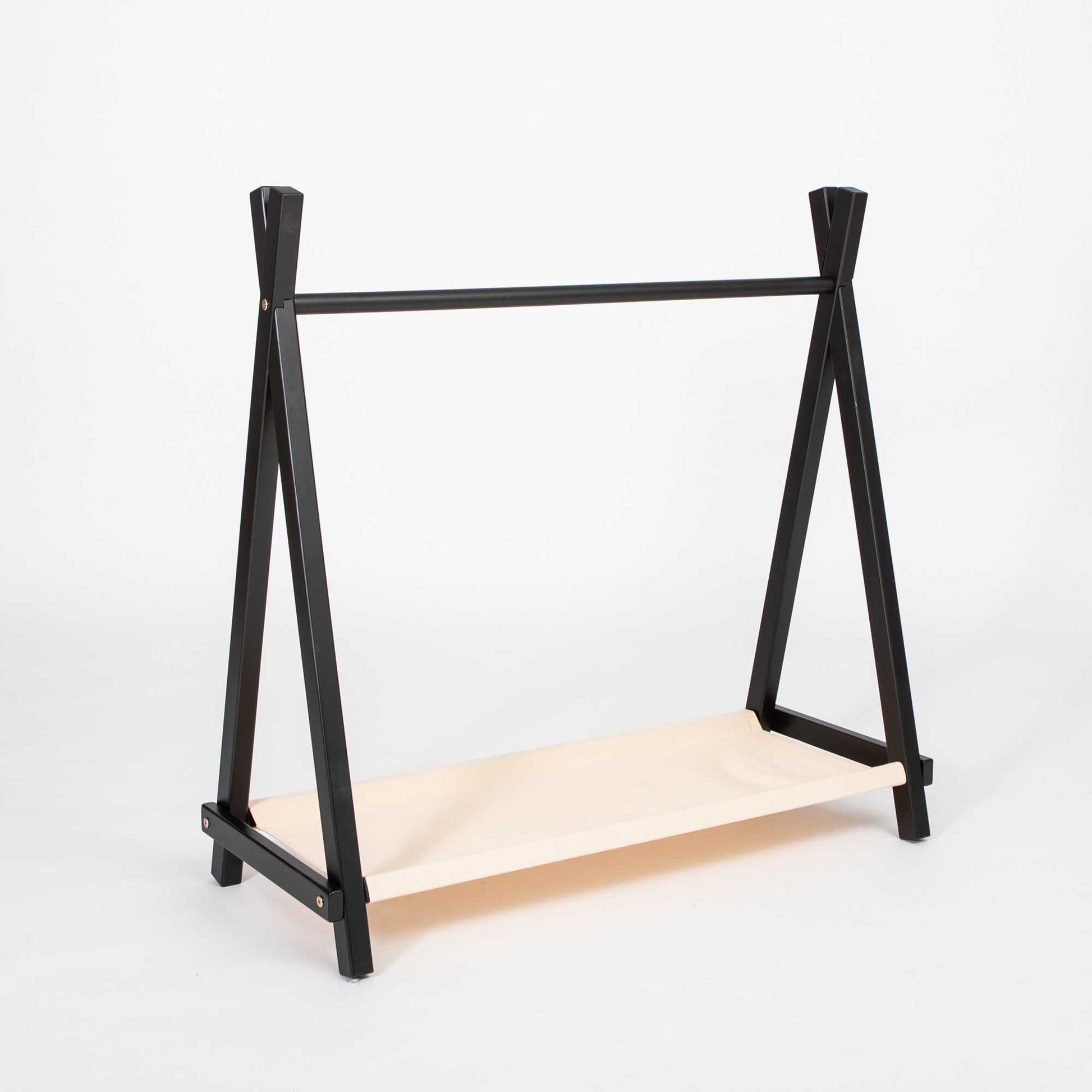 A black and white Kids' clothing rack with storage for Montessori storage, set against a pure white background.