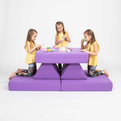 Three babies and toddlers sitting on top of a Sweet HOME from wood purple table, enjoying indoor activity play couch set activities.
