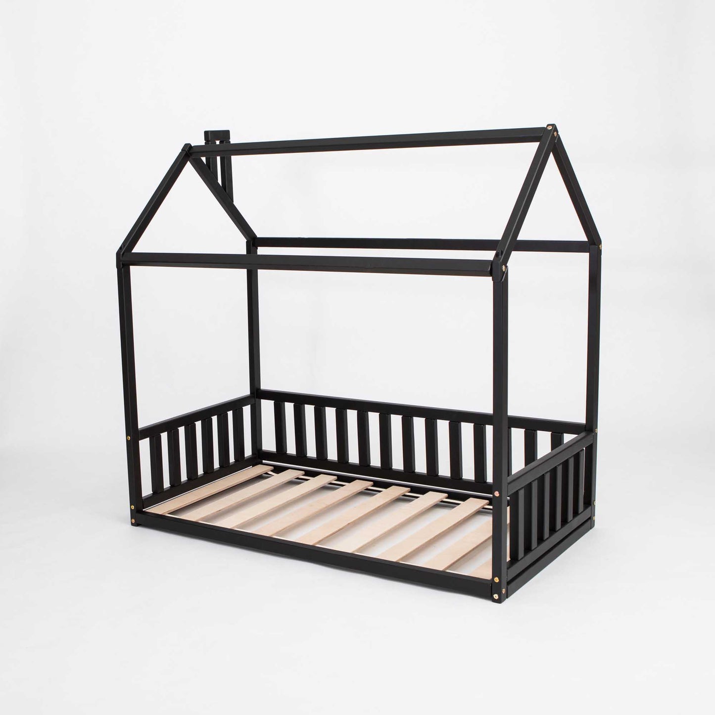 A cozy sleep haven with a wooden slatted frame, the Sweet Home From Wood Kids' House-Frame Bed with 3-sided rails is made of black wood, perfect for preschoolers.