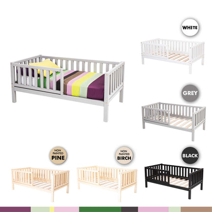A Sweet Home From Wood 2-in-1 toddler bed on legs with a vertical rail fence in different colors and sizes, perfect for a children's bed.