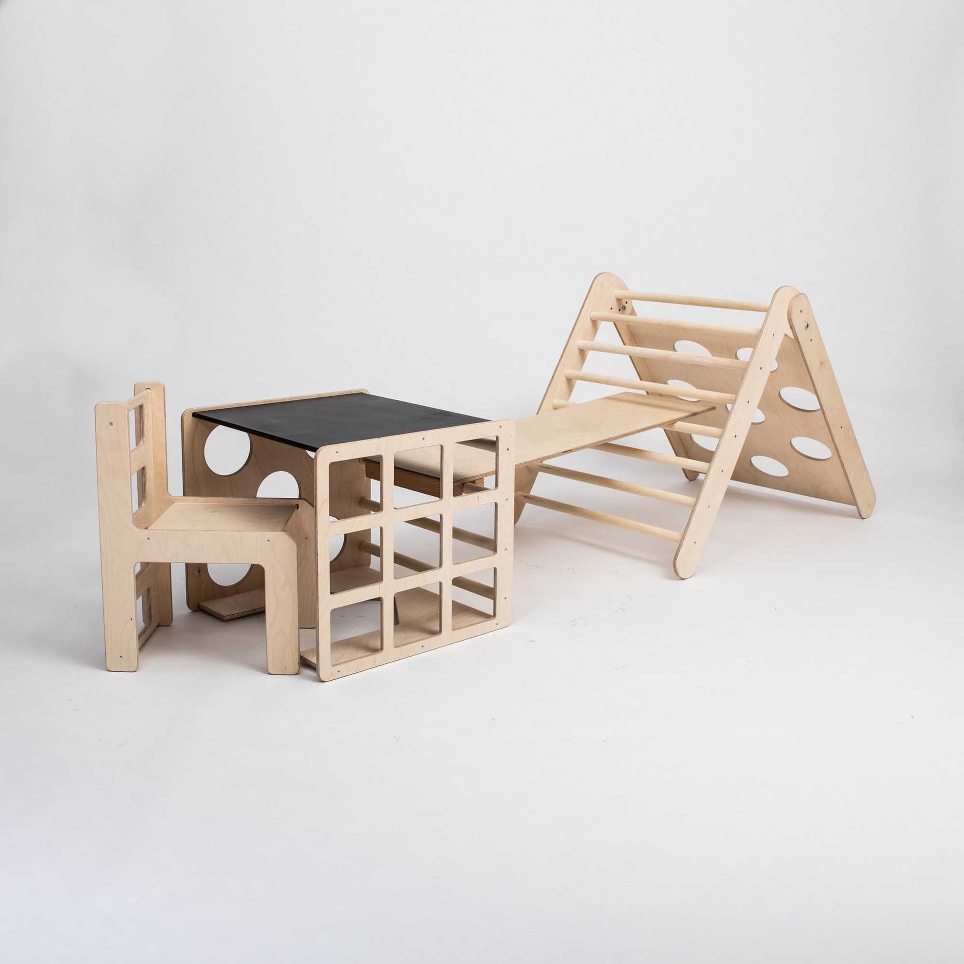 A Transformable triangle + climbing cube / table and chair  + a ramp with climbing fun and a chair.