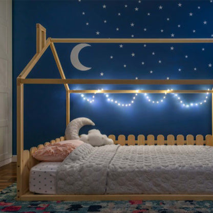 A low Floor house-frame bed with 3-sided picket fence rails for toddlers.