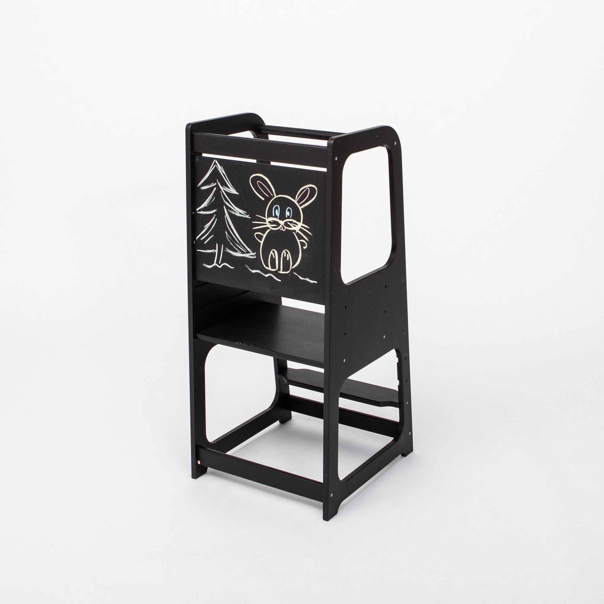 Black kids step stool featuring a chalkboard, set against a clean white background. A versatile and playful addition to any child's space.