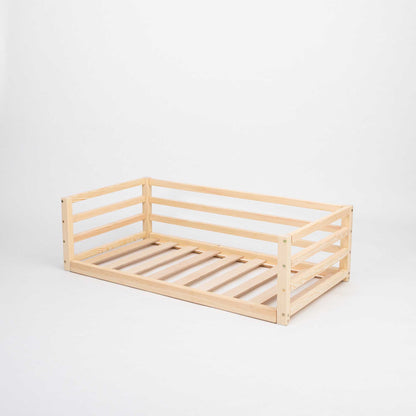A transitional Sweet Home From Wood wooden bed for children with slats on a white background.