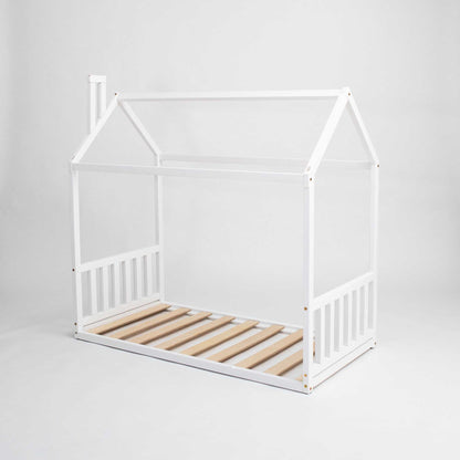 A cozy sleep haven with wooden slats, perfect for a Sweet Home From Wood Toddler house bed with a headboard and footboard.