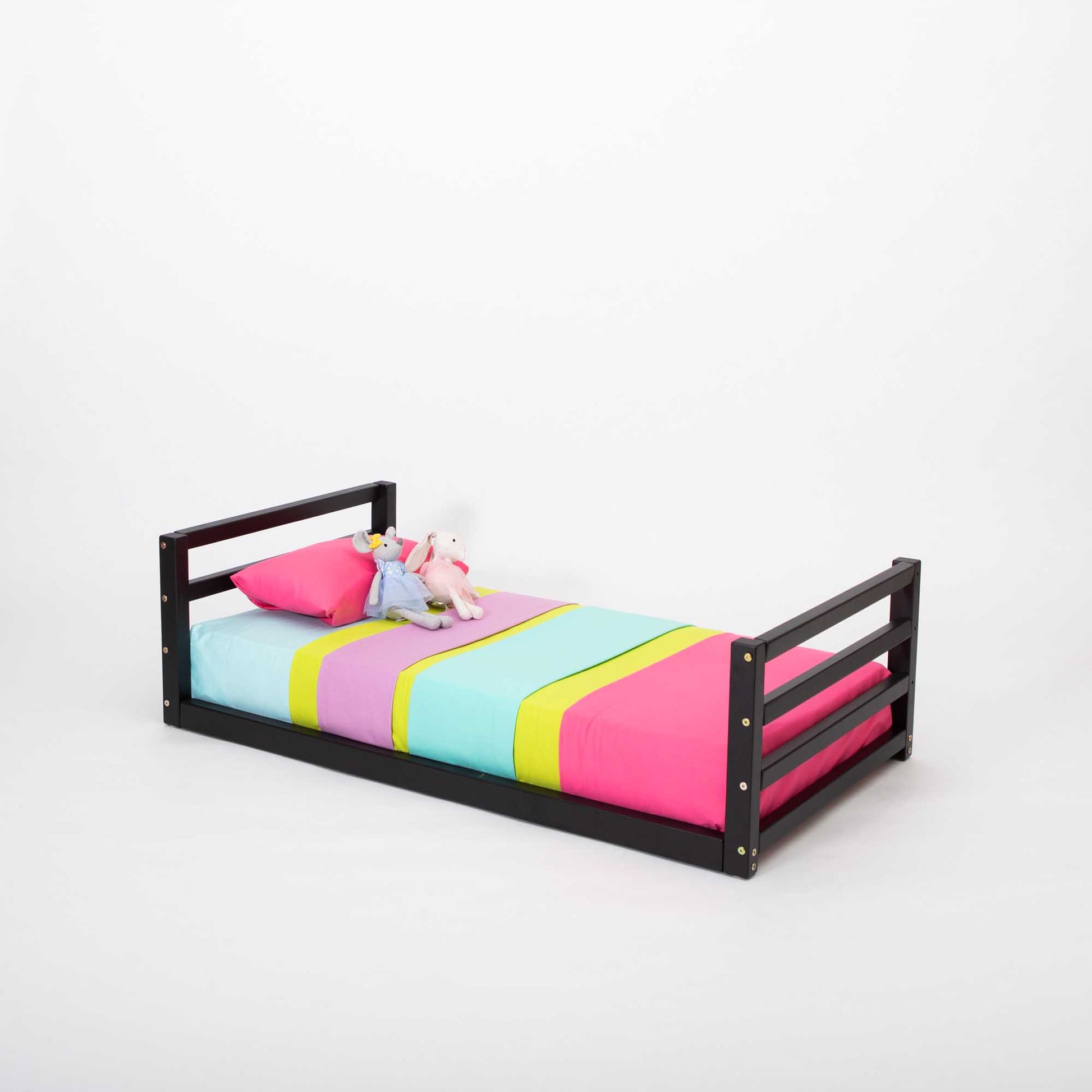 A colorful striped Sweet Home From Wood toddler floor bed with a horizontal rail headboard and footboard.