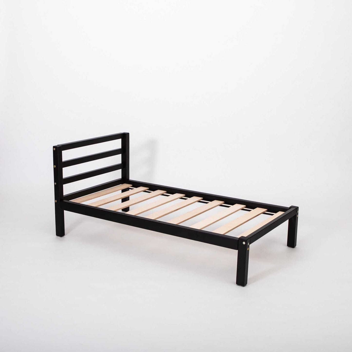 A sturdy black Kids' bed on legs with a horizontal rail headboard with wooden slats against a white background by Sweet Home From Wood.